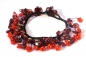 Preview: Armband 50x roter Granat 20x orangene Blumen längenvariabel geknotet